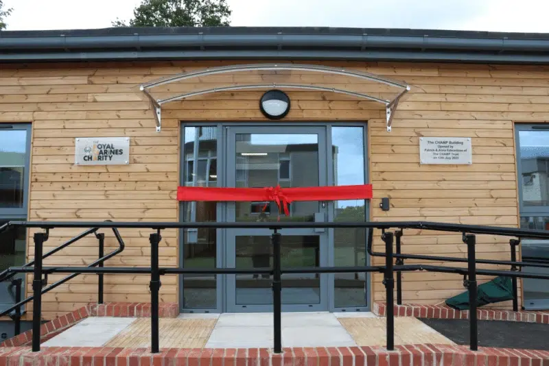 Royal Marines Charity modular healthcare building with timber cladding and accessible entrance