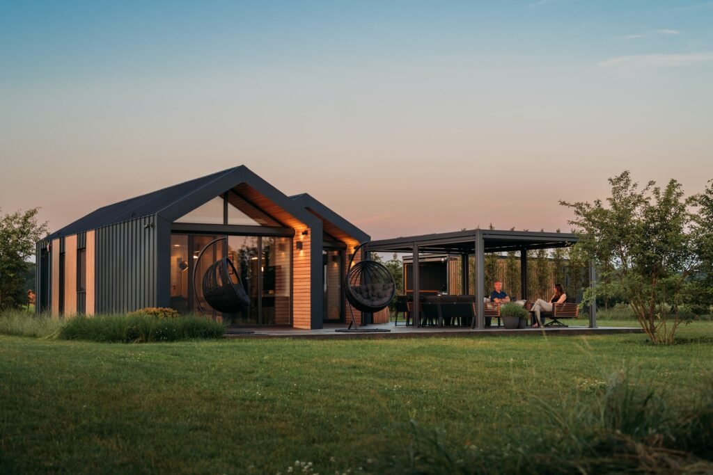 A luxury modular lodge in a field named The Sanctuary